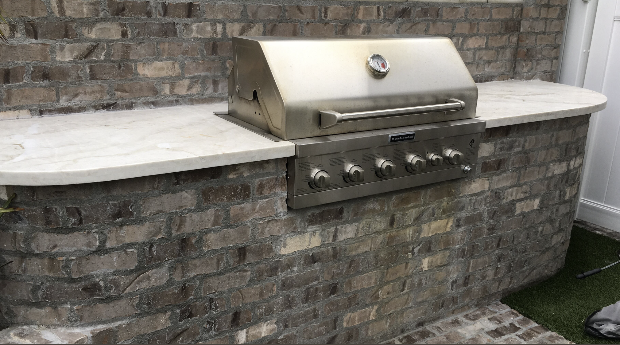 Front yard seating and grill